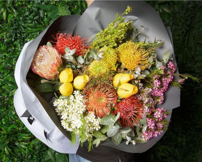 australian natives and yellow roses flower bouquet